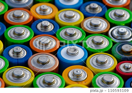 Old used batteries. Batteries background Old used batteries. Batteries background 110593109