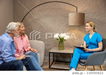 Elderly couple talks to a doctor about healthcare in adulthood. Elderly couple talks to a doctor about healthcare in adulthood. 110593822
