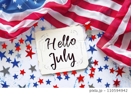 united states flag background with a hello july note 110594942
