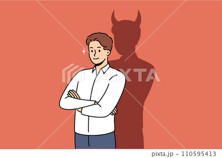 Confident businessman with bad thoughts stands with arms crossed near shadow with devil horns 110595413
