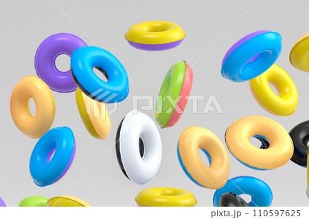 Many of flying inflatable ring for swimming pool isolated on white background 110597625