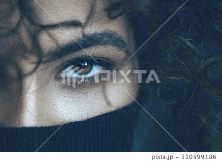 Eye close view. Human eye glance photo background. Emotional look Eye close view. Human eye glance photo background. Emotional look 110599186
