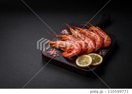 Tiger shrimp or langoustine boiled with spices and salt 110599771