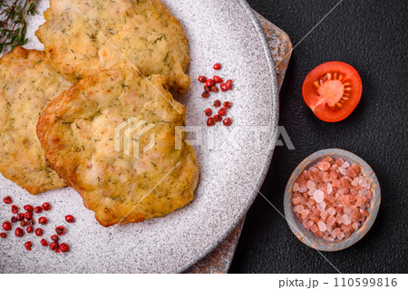 Delicious juicy fried chicken or pork pancakes with salt, spices and herbs Delicious juicy fried chicken or pork pancakes with salt, spices and herbs 110599816