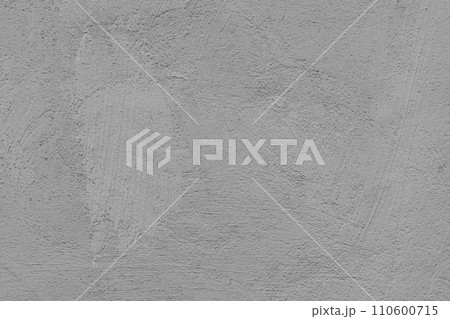 Stucco plaster surface, brushstroke background texture of gray painted cement, concrete wall Stucco plaster surface, brushstroke background texture of gray painted cement, concrete wall 110600715