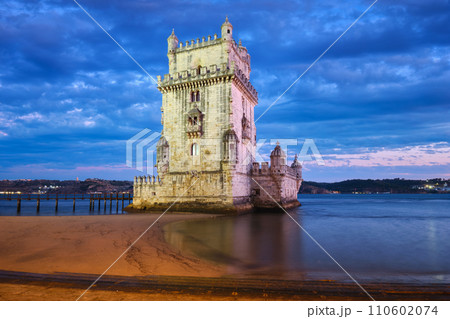 Belem Tower on the bank of the Tagus River in twilight. Lisbon, Portugal Belem Tower on the bank of the Tagus River in twilight. Lisbon, Portugal 110602074