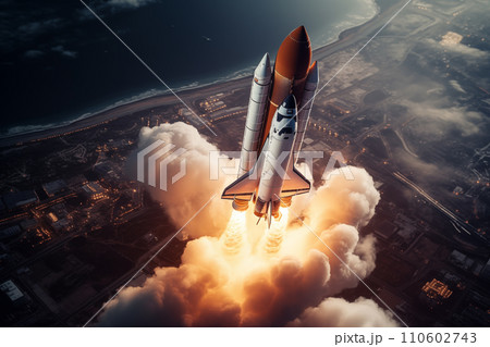 Aerial view of rocket launch at sunrise over ocean coast 110602743