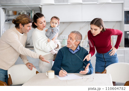 Family members discussing inheritance 110604782