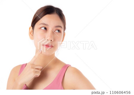 Portrait of beautiful young asian woman in sportwear smile and thinking isolated. Portrait of beautiful young asian woman in sportwear smile and thinking isolated. 110606456