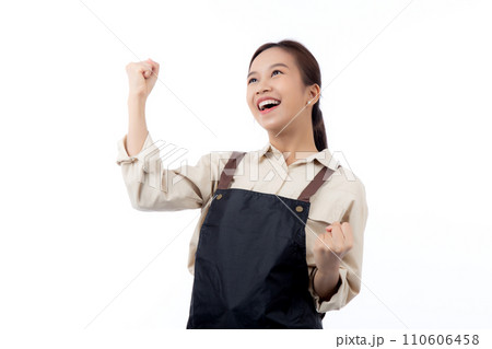 Portrait young asian barista woman wearing apron standing and smile isolated. 110606458