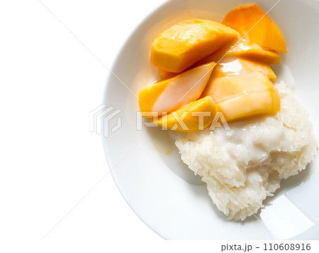 Mango with sticky rice ready to eat on white background Mango with sticky rice ready to eat on white background 110608916