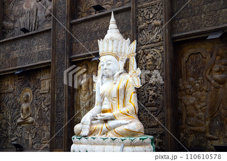 White Buddha statue at Gangaramaya Temple, it is one of the most important temples in Colombo 110610578