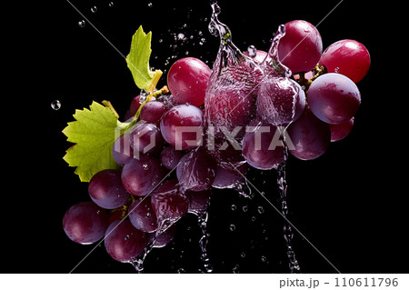 Generative AI A grape on a black background with splashes of water 110611796