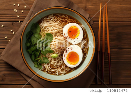 Bowl Japanese ramen. Noodle soup with egg and chop. Top view 110612472