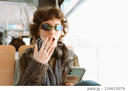 portrait teenage girl traveling by train 110613079