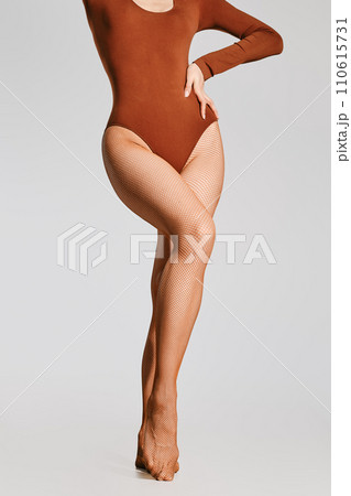 Muscular female legs of a dancer on tiptoe Muscular female legs of a dancer on tiptoe 110615731