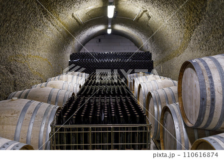 Wine cellars with barrels, traditional wine called Bikaver near Eger, Hungary 110616874