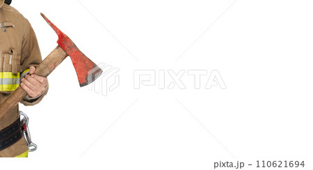 Unrecognizable male fireman in protective workwear holding red axe. Crop view of courageous rescuer with shabby hatchet tool, isolated on white studio background. Concept of job, fire equipment. 110621694