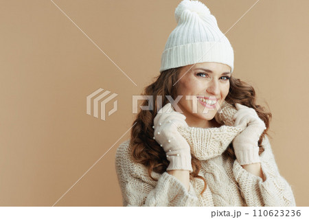 happy trendy woman isolated on beige background happy trendy woman isolated on beige background 110623236