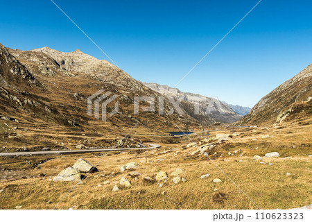 Mountain landscape with alpine lake on the Gotthard Pass, Canton of Ticino, Switzerland Mountain landscape with alpine lake on the Gotthard Pass, Canton of Ticino, Switzerland 110623323