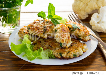 cooked vegetarian fried cauliflower cutlets in a plate cooked vegetarian fried cauliflower cutlets in a plate 110625108