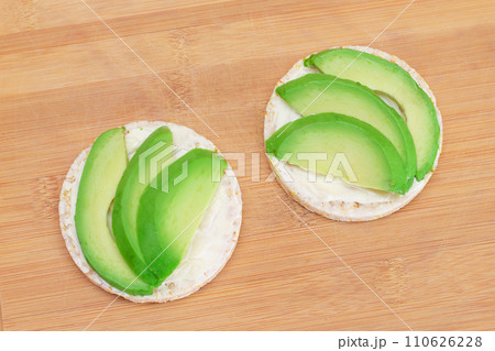 Rice Cake Sandwiches with Fresh Avocado and Cream Cheese 110626228