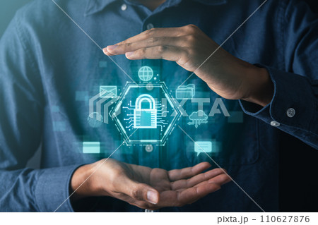 Businessman holding cyber security icons screen. Digital information technology and cyber security concept. 110627876