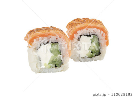 Sushi closeup isolated on white background. Sushi roll with red fish, trout, Philadelphia cheese and daikon. Japanese restaurant menu. Sushi closeup isolated on white background. Sushi roll with red fish, trout, Philadelphia cheese and daikon. Japanese restaurant menu. 110628192