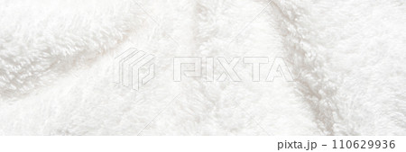 White shower towel texture. Fluffy carpet background. Blank bathroom textile 110629936