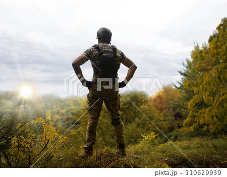 Sad soldier look to the sky 110629939