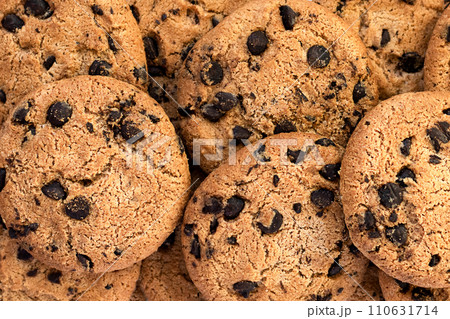 Cookies background. Chocolate chips biscuits texture background. Cookies background. Chocolate chips biscuits texture background. 110631714