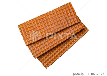 Delicious sweet crispy rectangular waffles on a ceramic plate Delicious sweet crispy rectangular waffles on a ceramic plate 110632573
