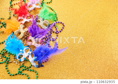 Mardi gras background with mask and feather 110632935