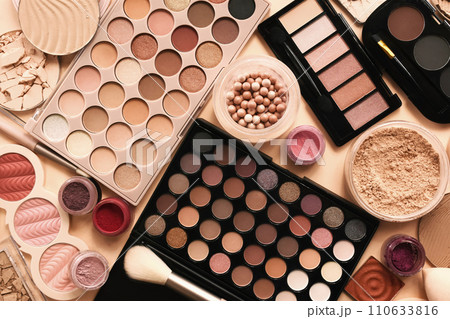 Varieties of face powders and foundations for perfect complexion, basic make up products to even out and matte skin, beauty cosmetics with brushes and sponges, selective focus, toned image	 110633816