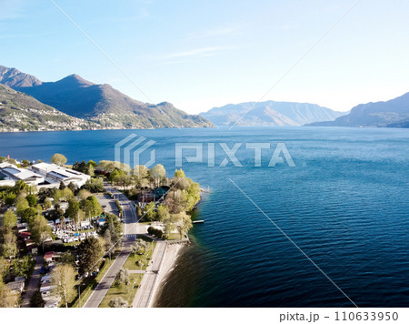 A beautiful view across the water with coastal landscape scenery changing along  110633950