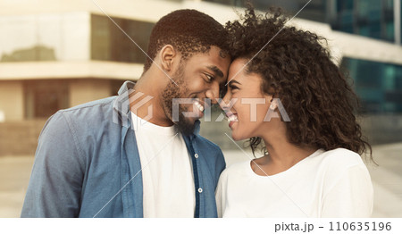 Tender couple touching foreheads, bonding to each other 110635196