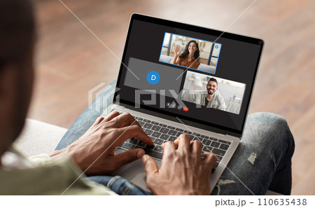 High angle view man have video chat with multiracial people 110635438