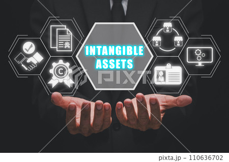 Intangible asset concept, Businessman hands holding intangible asset icon on virtual screen. Intangible asset concept, Businessman hands holding intangible asset icon on virtual screen. 110636702