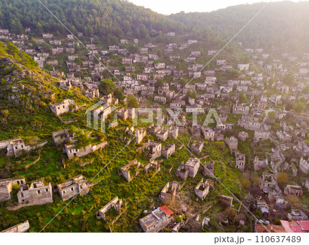 View from drone of ancient ruined settlement of Kayakoy, Turkey View from drone of ancient ruined settlement of Kayakoy, Turkey 110637489