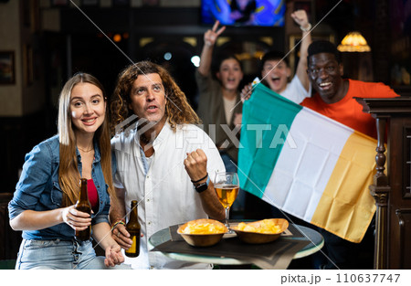 Team Ireland fans do not hide their emotions from the joy in beer bar. Ireland win Team Ireland fans do not hide their emotions from the joy in beer bar. Ireland win 110637747