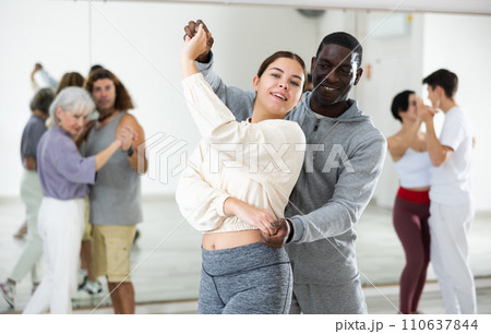 Dancing positive couples learning salsa 110637844