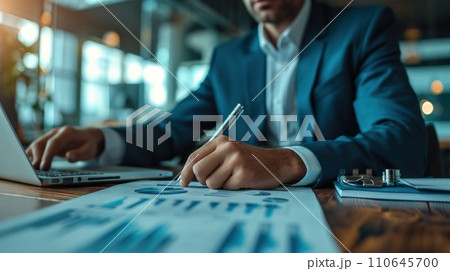Elegantly dressed executive analyzing charts, showcasing expertise and precision in financial decision-making Elegantly dressed executive analyzing charts, showcasing expertise and precision in financial decision-making 110645700