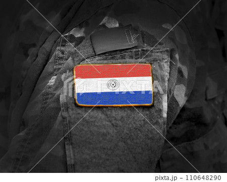 Flag of Paraguay on soldier arm. Flag of Paraguay on military uniforms (collage). Flag of Paraguay on soldier arm. Flag of Paraguay on military uniforms (collage). 110648290