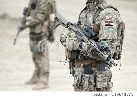 Soldiers with machine gun and flag of Egypt on military uniform. Collage. 110648575