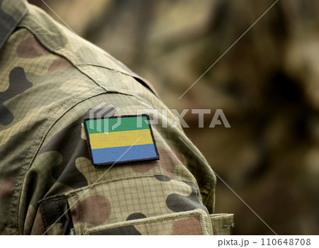 Flag of Gabon on military uniform. Army, troops, soldiers, Africa,(collage). Flag of Gabon on military uniform. Army, troops, soldiers, Africa,(collage). 110648708