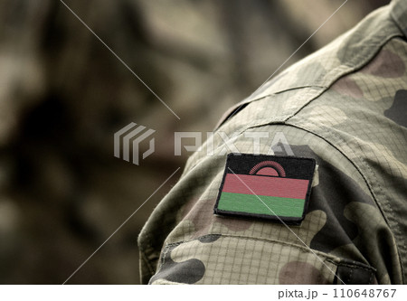 Flag of Malawi on military uniform. Army, troops, soldiers. Collage. Flag of Malawi on military uniform. Army, troops, soldiers. Collage. 110648767