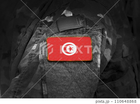Flag of Tunisia on military uniform. Army, troops, soldiers. Collage. Flag of Tunisia on military uniform. Army, troops, soldiers. Collage. 110648868