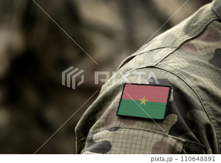 Flag of Burkina Faso on military uniform. Army, troops, soldiers, Africa, (collage). Flag of Burkina Faso on military uniform. Army, troops, soldiers, Africa, (collage). 110648891
