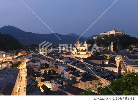 Salzburg cityscape at night with fortress Hohensalzburg, Austria 110649241