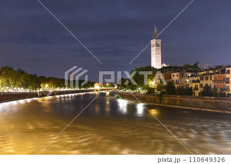 Verona cityscape at night with Sant' Anastasia Church (Campanile Sant Anastasia) and Adige River, Verona, Italy Verona cityscape at night with Sant' Anastasia Church (Campanile Sant Anastasia) and Adige River, Verona, Italy 110649326